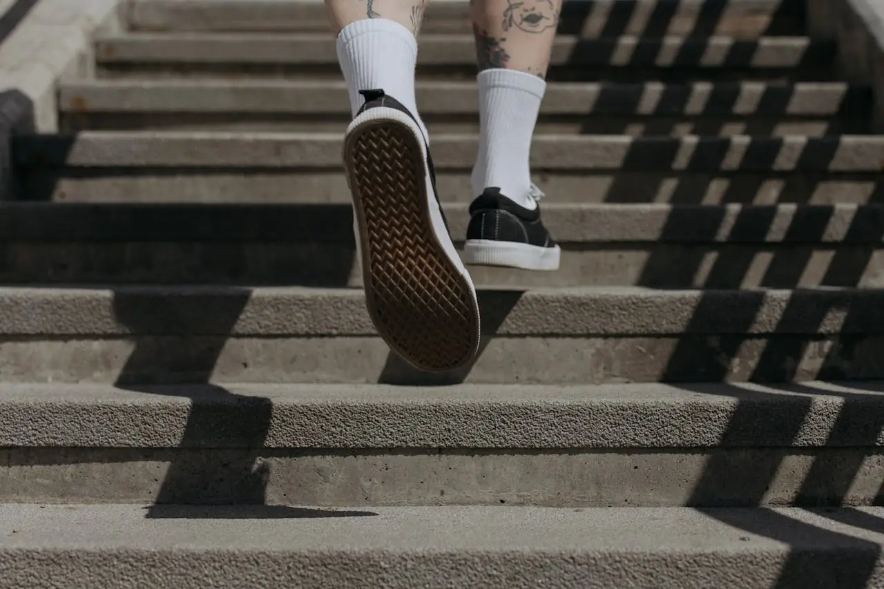 Person walking up the stairs