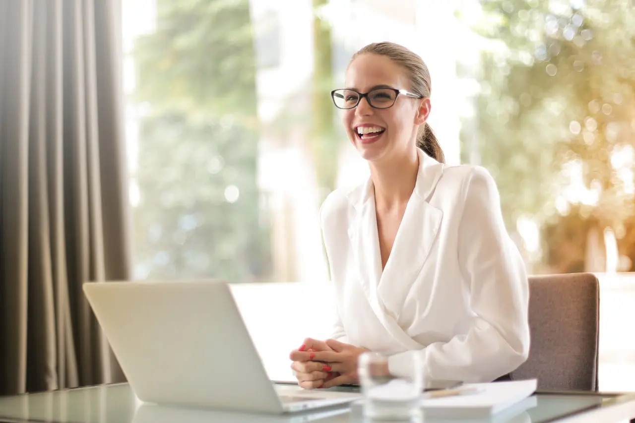 Laughing businesswoman in an office