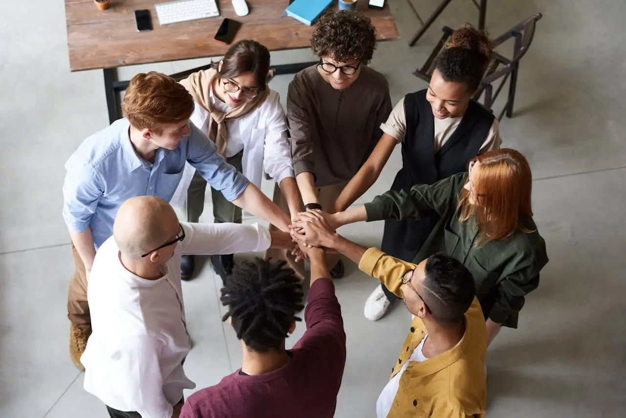 A team holding hands
